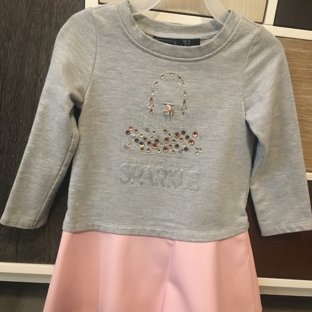 Gray sweatshirt w attached pink leatherette skirt